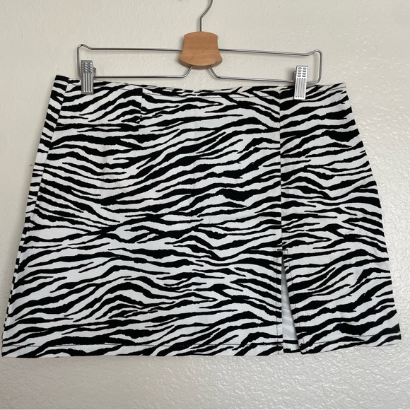 BDG Dresses & Skirts - BDG zebra print denim mini skirt Sz L